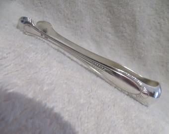 silver metal sugar tongs art deco style goldsmith Perrin mid 20th c French silver-plated sugar tongs 12.9cm