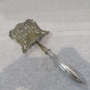 Asparagus server 950 silver handle Minerva Louis XVI style pearl decor early 20th c French 950 silver & golden metal asparagus server