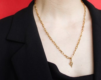 Long gold chain necklace with seashell pendant