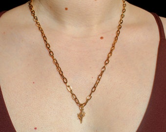 Long gold chain necklace with seashell pendant