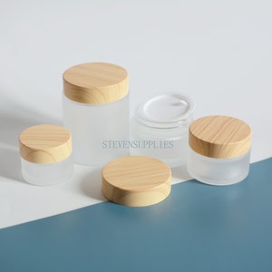 3/500px 5g 15g 30g 50g 100g Frostade glaskrämburkar, Plastlock med bambu-träliknande utseende, Skönhetsförpackningsflaskor, Kosmetisk ansiktsvård, Bulk