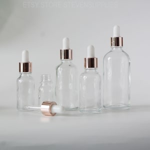 Leere neue Rose Gold Tropffläschchen Transparent Glas Boston Flasche Behandlung Hautpflege Verpackung ätherisches Öl Parfüm Duftbehälter