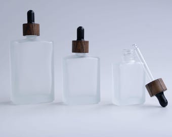 30 ml 50 ml 100 ml verre carré huile essentielle parfum flacon compte-gouttes vide noir bouchons en bois compte-gouttes transparent corps sérum emballage en gros