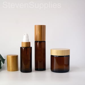 Emballage cosmétique naturel, verre ambré transparent, bouchon en bambou, bouteille de pompe de lotion et pot de crème vide, nouvelle crème cosmétique, lotion de soin de la peau pour l'huile