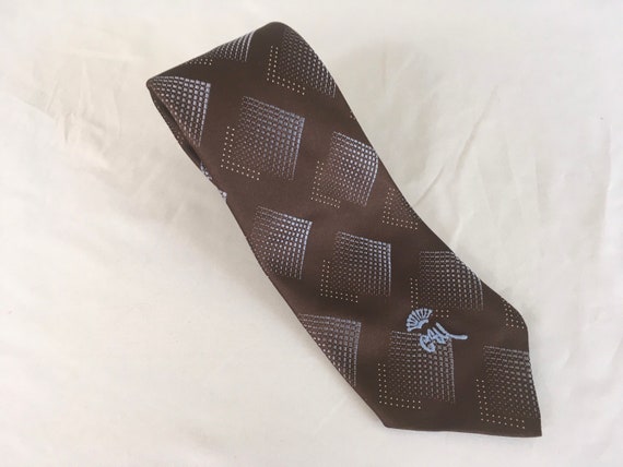 Brown necktie with tan and blue pattern, Geometri… - image 1