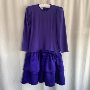 Royal blue 1980s party dress with ruffles and bow, 80s party dress with big shoulders and ruffled skirt, 80s prom dress with bow