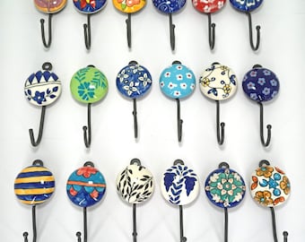 Handgeschilderde keramische muurhaken: kleurrijke, decoratieve kleerhangers