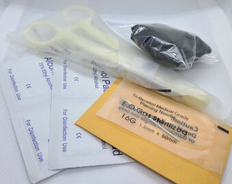 Kit de perforación de acero quirúrgico: agujas, guantes y pinzas