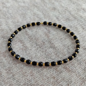 DHALIA Bracelet - Delicate black and gold bead stacking stretch bracelet