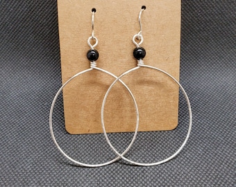 Round hammered hoops with black onyx beads