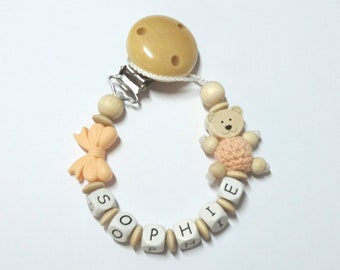 Pacifier necklace with name in Apricot with bear and bow, gift for birth