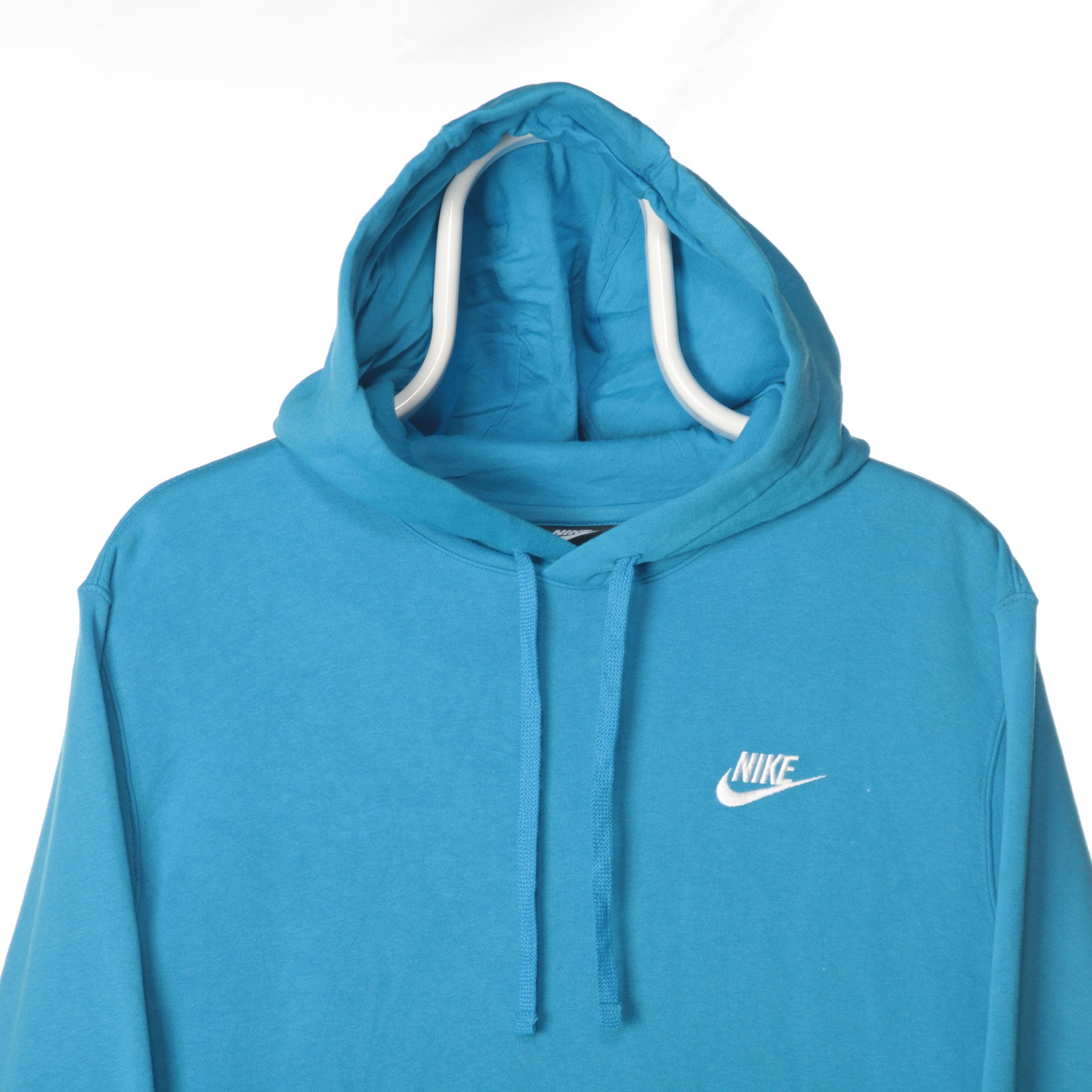 white nike hoodie with blue swoosh