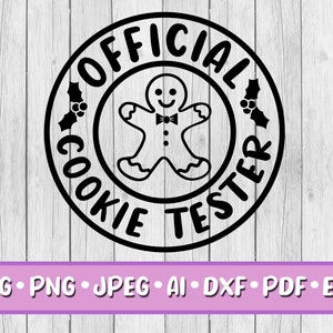 May include: Black and white circular design with the text "OFFICIAL COOKIE TESTER" around a gingerbread man. The design includes holly accents and is set against a light wood grain background. The bottom banner includes file type options.