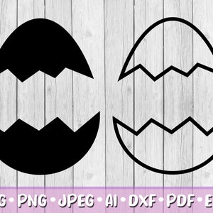 May include: A black and white outline of a cracked egg. The egg is split in half with a jagged edge. The outline is on a white wood background.