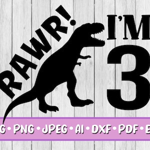 May include: Black and white graphic design featuring a dinosaur with the text "RAWR! I'M 3" on a woodgrain background.