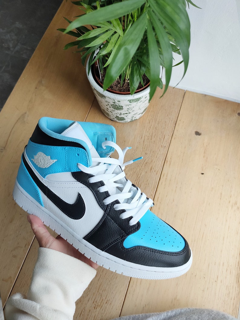 light blue and black air jordan 1