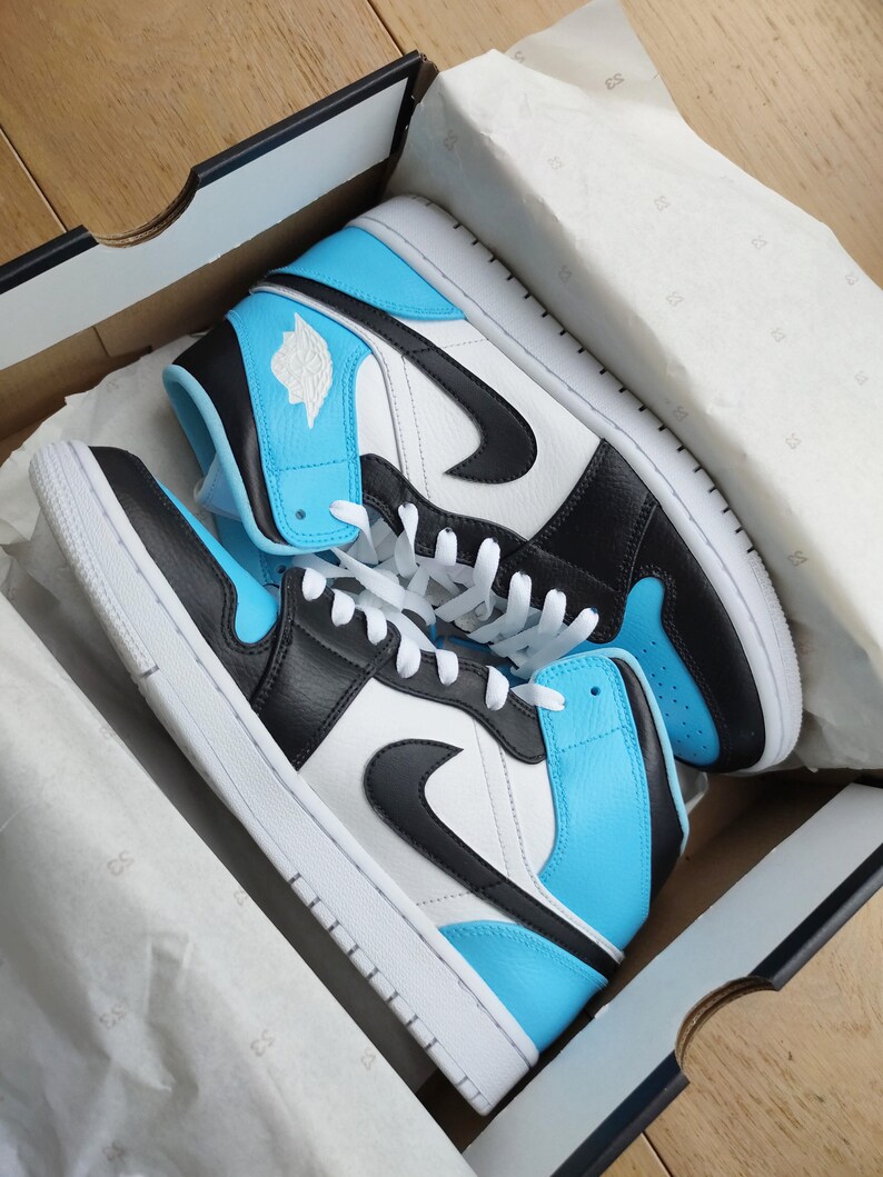 light blue and black air jordan 1