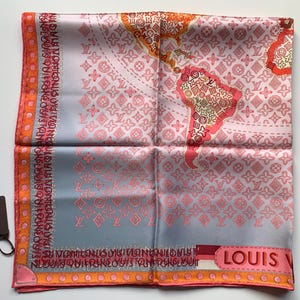 May include: A white ceramic mug with a black handle and the text "But First, Coffee" in a bold, black font. The mug is set against a blurred background, suggesting a cozy setting. The mug appears to be approximately 4 inches tall.