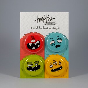 Pack de 4 chapas de divertidos y coloridos Monstruos 37mm Pin Badge