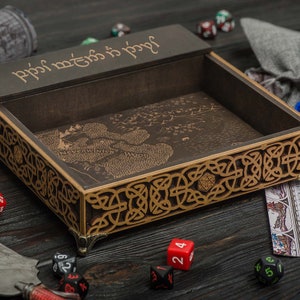 May include: A wooden dice tray with a map of Neverwinter printed on the inside. The tray has a Celtic knot design around the edge and is decorated with the words "Roll for the Troll".