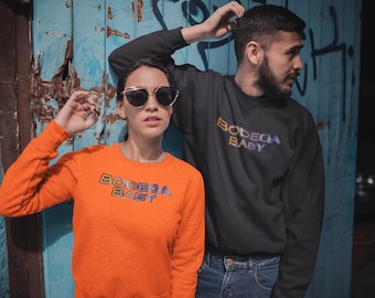 Bodega Baby Unisex Sweatshirt | NYC Streetwear | New York Inspired Crewneck | Urban Fashion for Men & Women