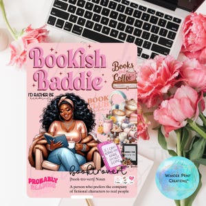 May include: Pink mousepad with the words "Bookish Baddie" and an illustration of a woman reading a book. The mousepad also features the text "Books and Coffee", "Book Club", and "booktrovert". A laptop and pink flowers are in the background.