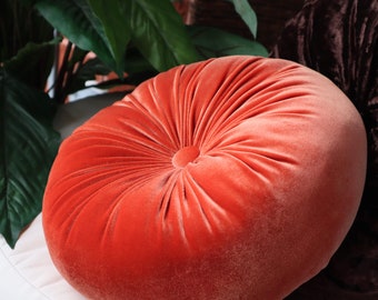 round orange pillows