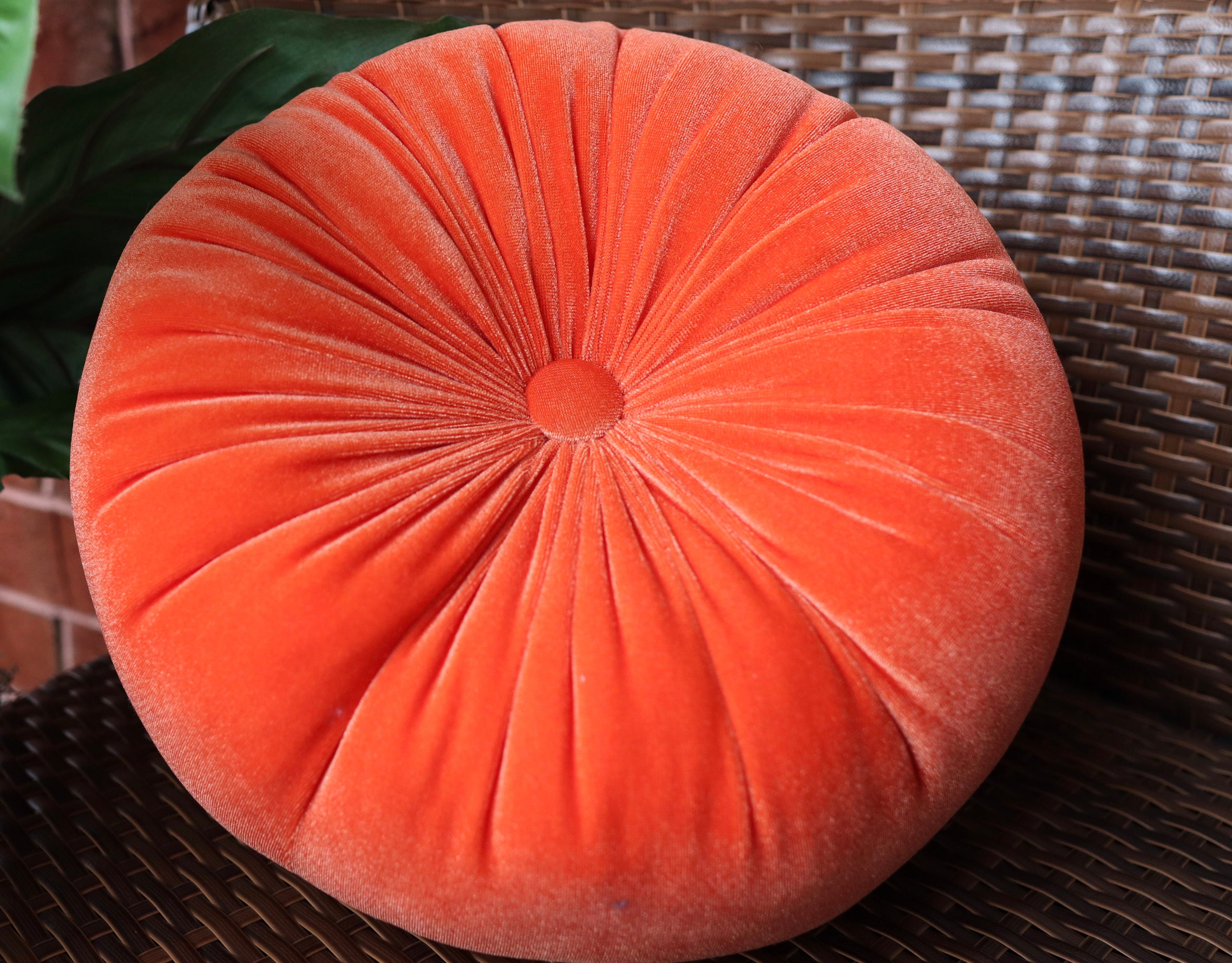 orange round throw pillow
