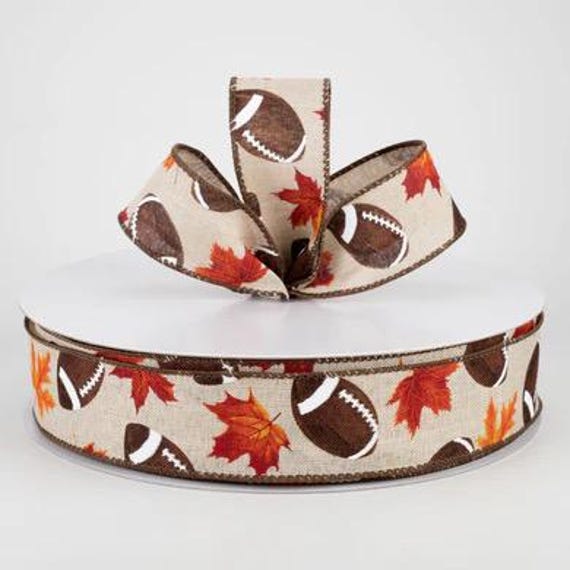 Wired 1.5” Linen Fall Leaf Football Ribbon: Natural in 10yd loose ribbon rolls with brown stitching on its wired edges. Spliced in one area.