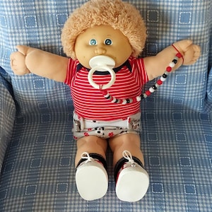 Lalka Cabbage Patch, blond, kudłate włosy, niebieskie oczy