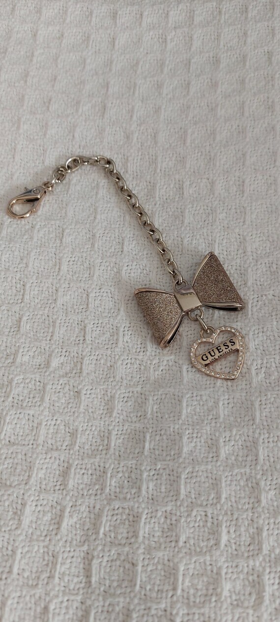 Guess used silver Gem