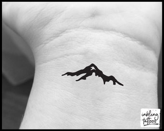 150 Tattoo Ideas For Mountain Lovers  Body Art Guru  Small tattoos for  guys Mountain range tattoo Tattoos for guys