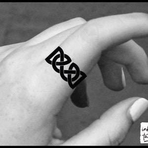 Celtic knot wedding band tattoo store