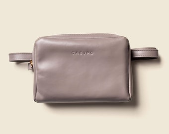 Dusty rose, grey, lilac leather fanny pack for women to go to concerts, parties, vacation or games. Belt bag, hip bag or crossbody bag.