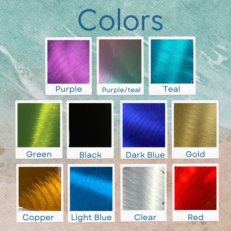 May include: A chart showing different colours of thread, including purple, teal, green, black, dark blue, gold, copper, light blue, clear, and red.