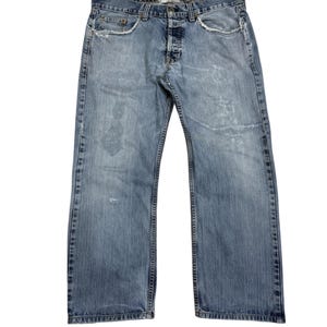 STUSSY DISTRESSED JEANS