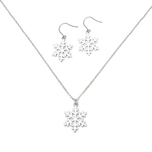 May include: A silver snowflake necklace and matching earrings set. The necklace has a delicate chain and a snowflake pendant. The earrings are dangle earrings with snowflake charms.