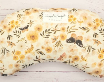 Almohadilla térmica de algodón orgánico con estampado floral para aliviar el dolor menstrual