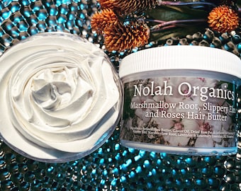 May include: A white jar of Nolah Organics Marshmallow Root, Slippery Elm and Roses Hair Butter. The jar is on a blue and white background.