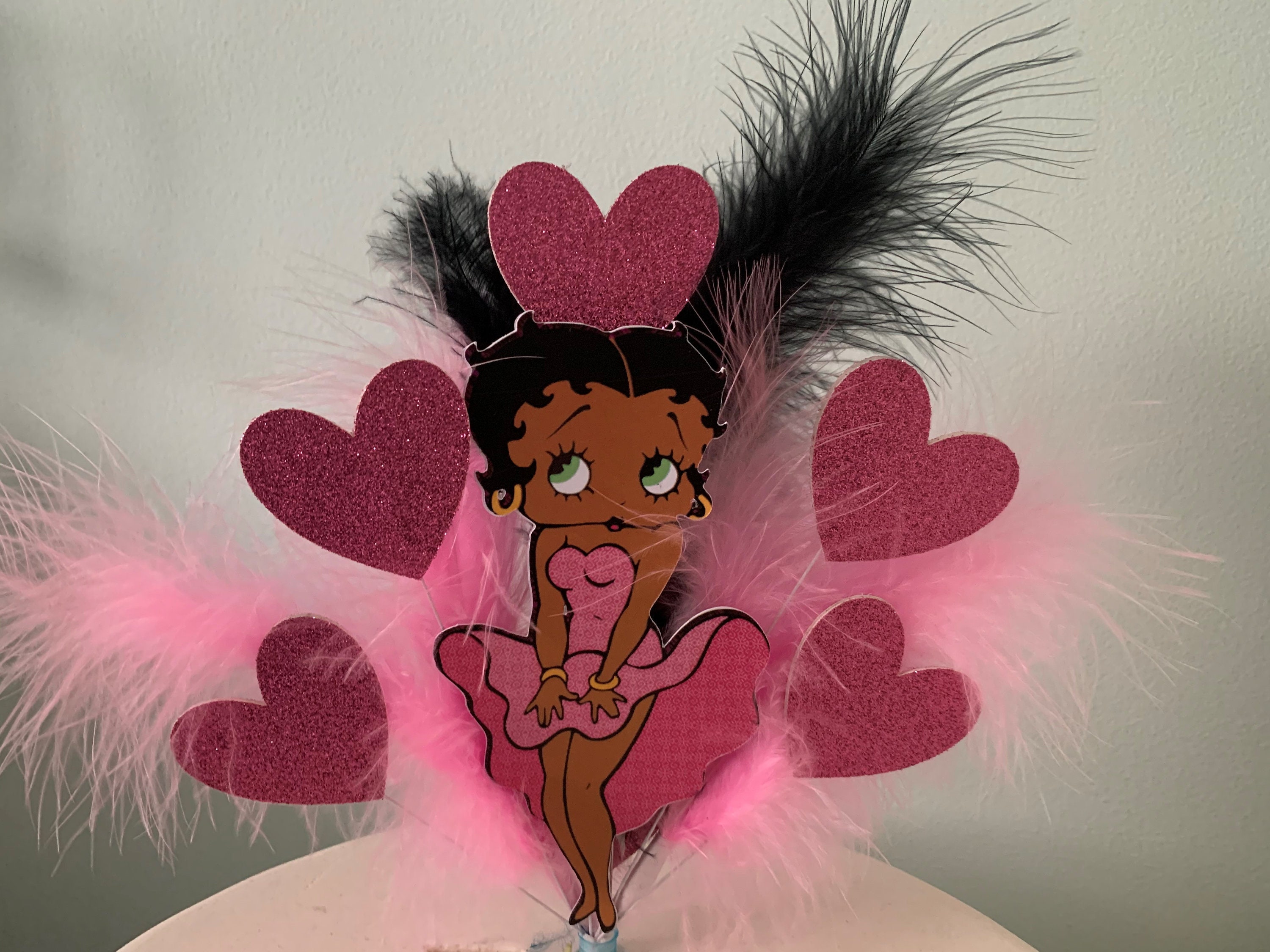 Betty Boop with feathers Birthday cake topper in pick, Betty boop display