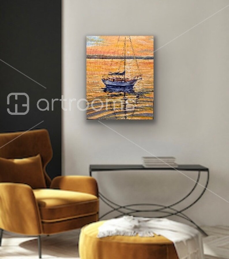 May include: A painting of a sailboat on a calm body of water at sunset. The water is a golden color and the sky is a soft orange. The sailboat is white with a blue hull and has a white sail.