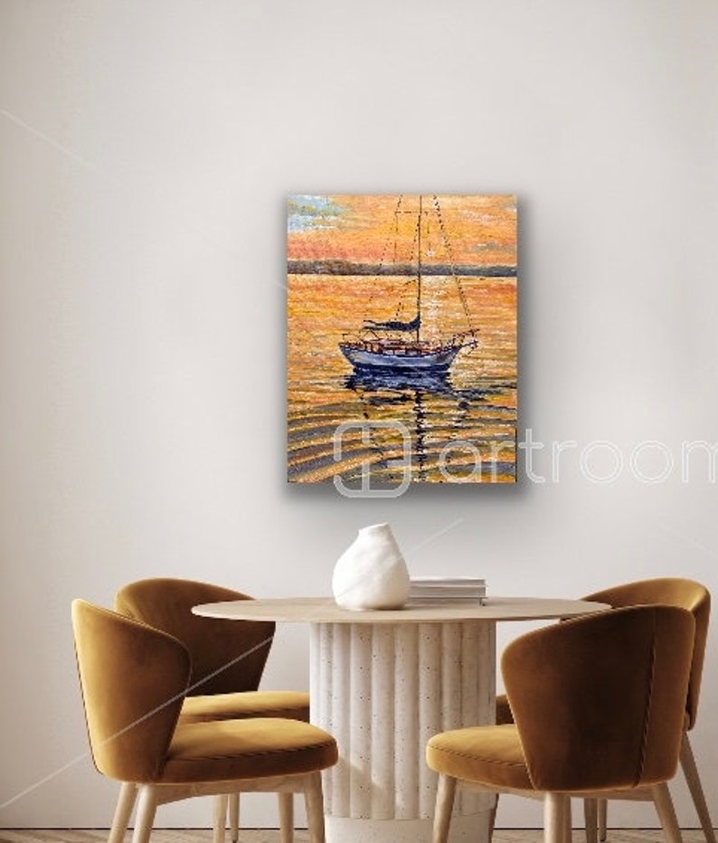 May include: A painting of a sailboat on a body of water at sunset. The water is a deep blue and the sky is a vibrant orange and yellow. The sailboat is white with a blue hull and has a brown mast and sails.