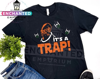 May include: Black t-shirt with an orange graphic of a Star Wars character with the text "It's a Trap!"