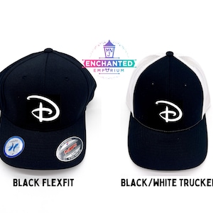 May include: Two black baseball caps with a white Disney logo. The cap on the left is a black flexfit cap. The cap on the right is a black and white trucker cap.
