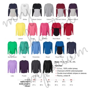 May include: A chart showing different color options for a long-sleeved t-shirt with contrasting colored sleeves. The t-shirt is available in sizes XS, S, M, L, XL, and 2XL. The t-shirt is made of 100% cotton jersey, except for the charcoal color, which is 60/40 cotton/polyester. The t-shirt has double tonal athletic stripes on the sleeves and a roomy, unisex fit.