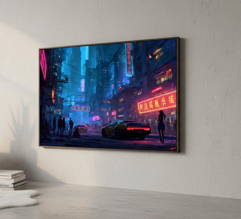 May include: A framed digital art print depicting a futuristic cityscape at night. The scene is illuminated by neon lights in shades of pink, blue, and red. A yellow sports car is parked on the street, and figures of people are visible.