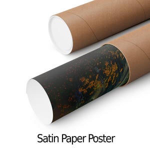 May include: Two brown cardboard tubes with white end caps, one partially unrolled to reveal a colorful print. The print features a dark background with orange and yellow accents. The text "Satin Paper Poster" is at the bottom.