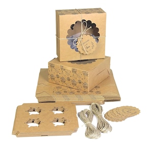 Puede incluir: Un conjunto de cajas de cartón marrón para cupcakes con ventana, forros para cupcakes, cuerda y etiquetas que dicen "hecho a mano con amor".