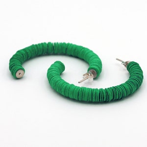 Colourful, fun and sustainable, the green Helen hoop earrings handmade in the UK using recycled materials.