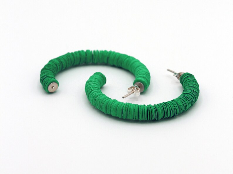 Colourful, fun and sustainable, the green Helen hoop earrings handmade in the UK using recycled materials.